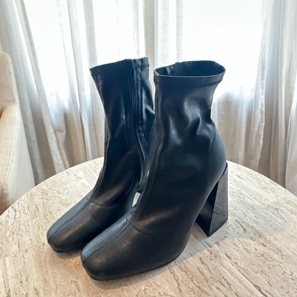 Black leather booties with chunky heel